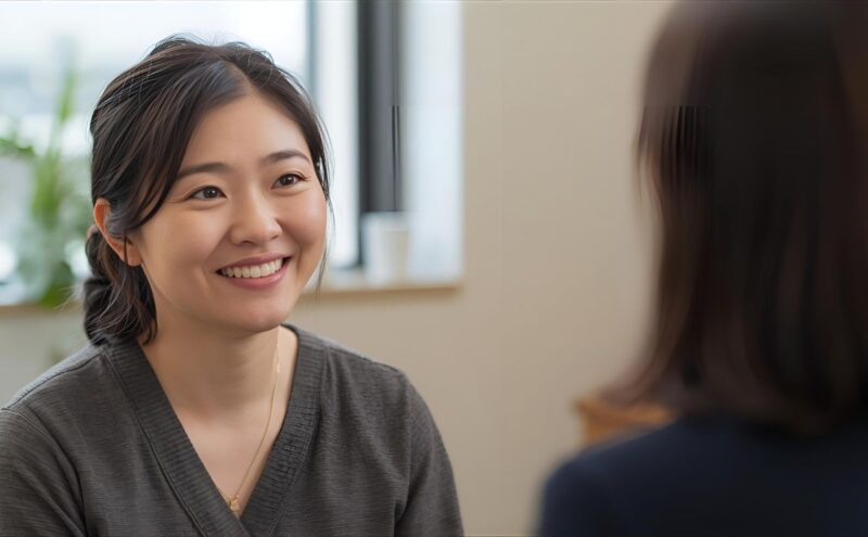 カウンセリングを受けて笑顔を取り戻した女性